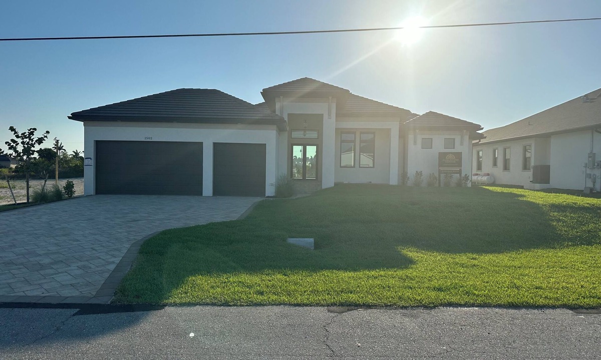 Burnt Store House | Beautiful 2023 NW Cape Coral waterfront home with pool, hot tub, dock, kayaks