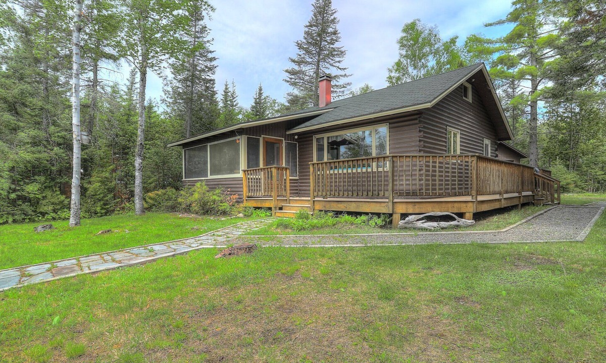 Rangeley Plantation House | Camp Chuck-a-luck | Private Beach, Dock, Kayaks | Dog-Friendly Mooselookmeguntic Lake Cabin