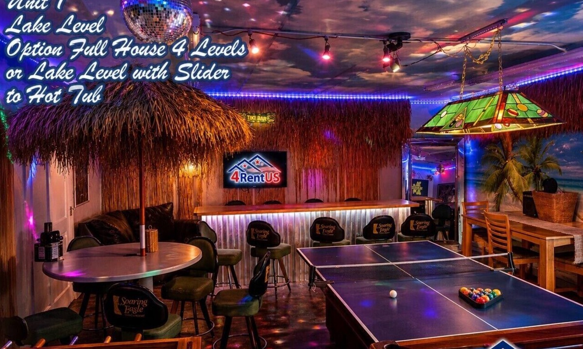 Grand Rapids Apartment | Campau Lake Escape |1 of 4 levels | Hot tub karaoke game room