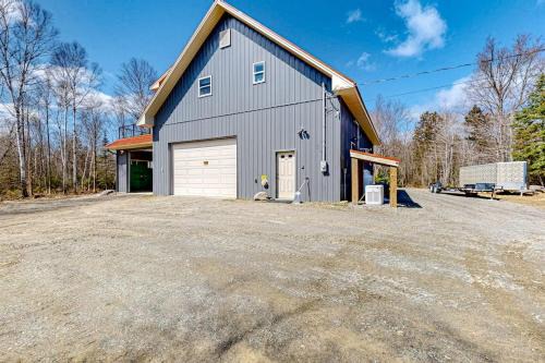 Rockwood House | Dog-friendly apartment by Moosehead Lake with sprawling deck & firepit