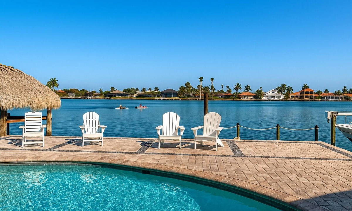 Eight Lakes Villa | Dolphin Cove Villa Gulf Access Waterfront Heated Pool & Hot Tub Game Room