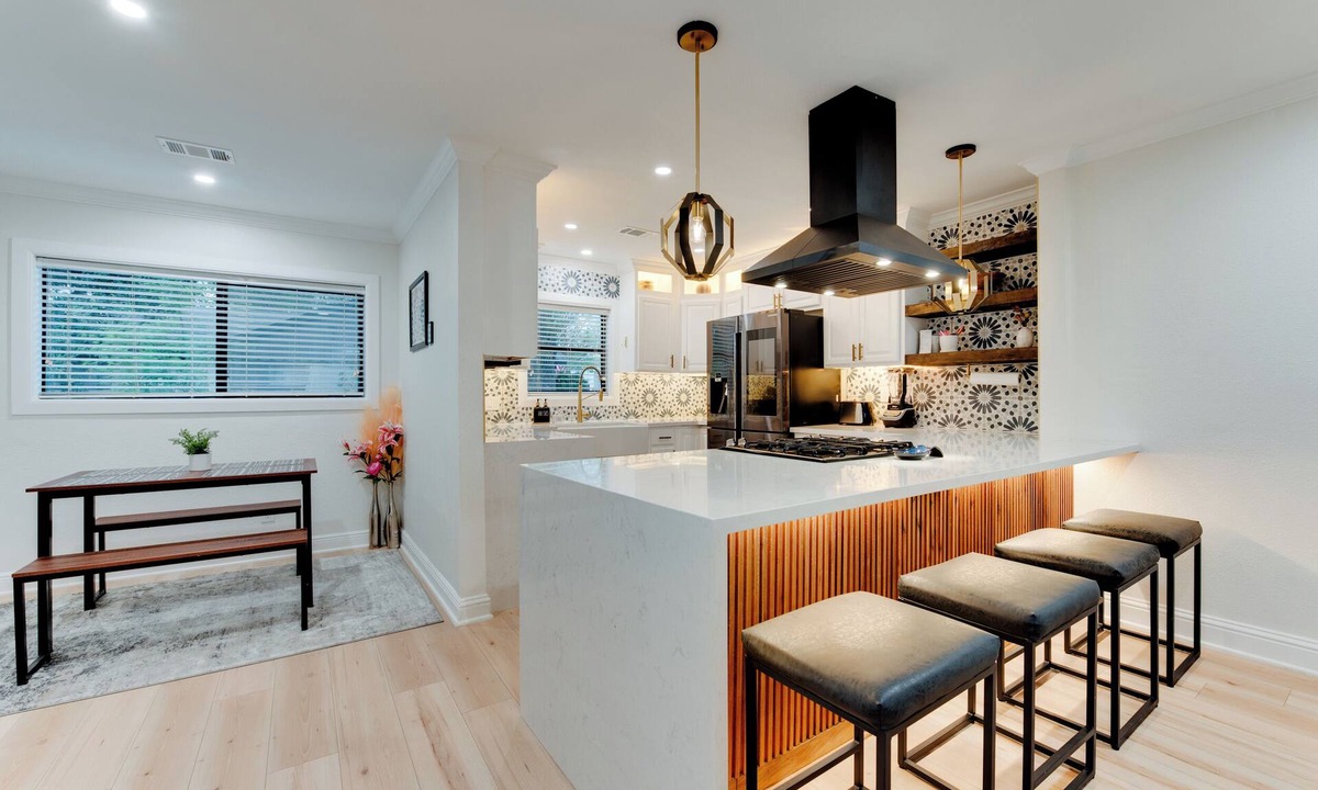 Spring Branch Central House | Durango is a centrally located Spring Branch home near Memorial City Mall, with quick access to Buffalo Bayou Park and The Galleria for outdoor fun, shopping, and dining. Enjoy a fully fenced outdoor retreat with a patio swing + fire pit, and foosbal