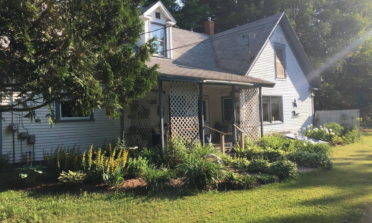Brighton House | Lakeview Farmhouse with private beach access and on snowmobile VAST trail.