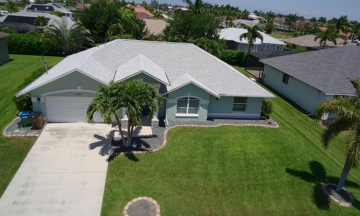Pelican House | Private Tropical Oasis Heated Pool Outdoor Living Perfect Family Vacation