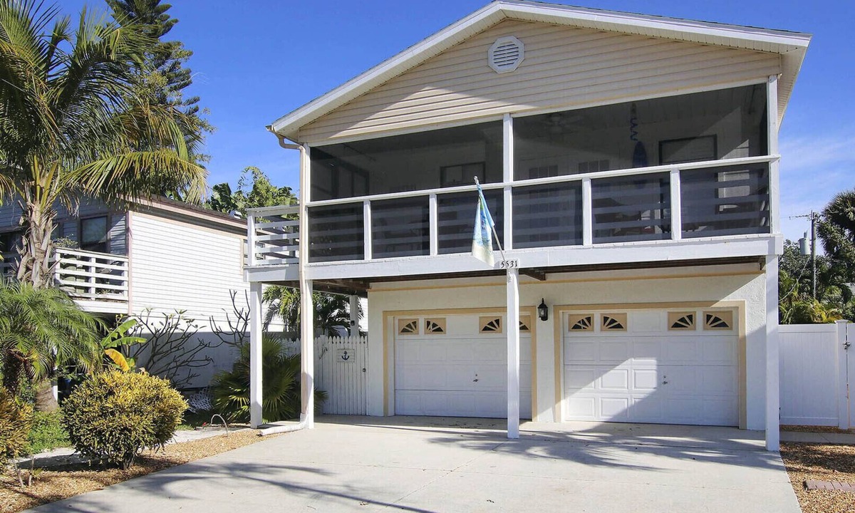 Mid Island House | Rare Find! Sea Breeze Gulf Home. Heated Pool, steps to the Beach.