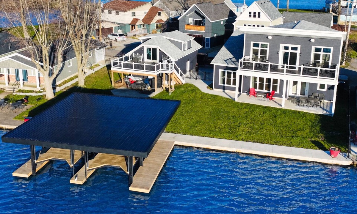 Russells Point House | SUNSET RETREAT-Luxury 4BR, 4.5BA waterfront, boat lift, best sunset on the lake!