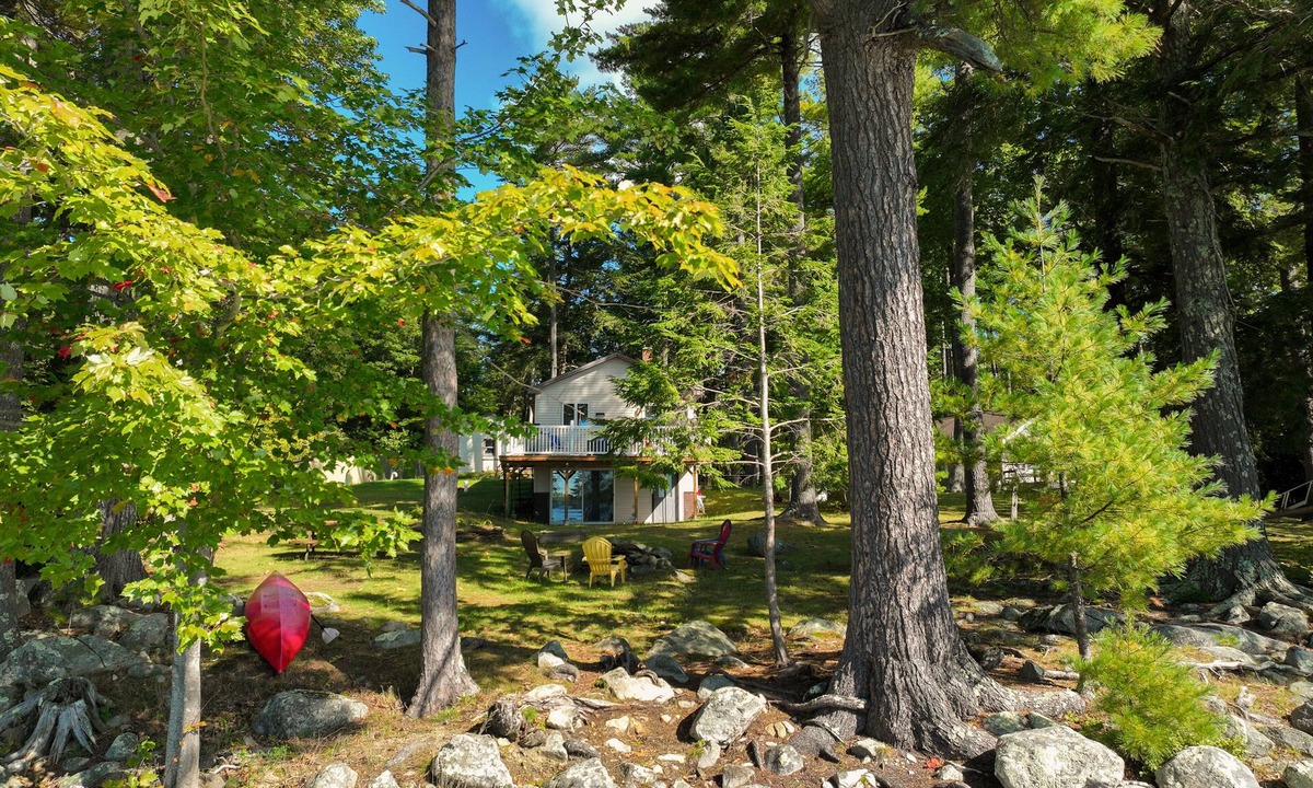South China House | Two-story lakefront home with a seasonal dock, furnished deck, & washer/dryer