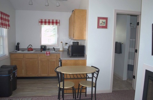 Norway Cabin | 1 bedroom cottage with queen bed and whirlpool tub and large raised deck.