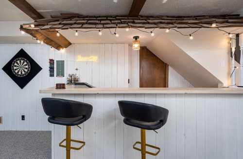 Wyoming House | 10 minutes from GR. High end retro retreat with hot tub, bar, and board games.