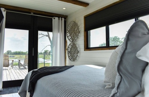 China Spring House | 2-bedroom Tiny Home on 42 Acres in Magnolia Ranch Waco has AC, Stock Ponds.