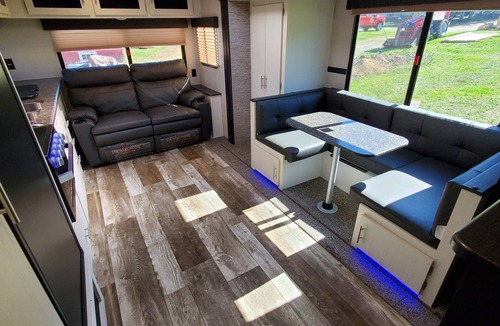 Eustis House | 27ft Nightly Rental RV in Sylvester Farm Campground and Cabins.