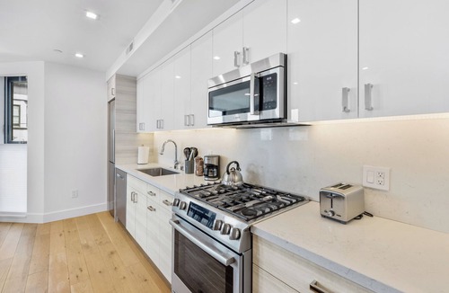 Mission District Apartment | 2BR 1BA Condo w Rooftop Deck - San Francisco Life Real Estate n