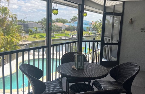 Pelican Condo | 2BR CONDO W/POOL ON CANAL