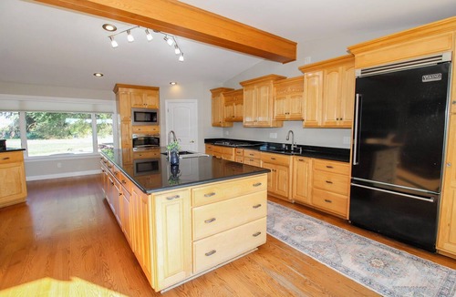 Bellevue House | 5000+ Sq Ft retreat w/pool, tanning bed, and gym near Cedar Point and Lake Erie