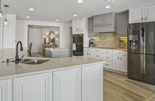 Caloosahatchee House | A Luxurious 4BR/4BA waterfront wellness retreat with saltwater pool, sauna, cold plunge