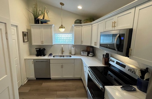 Saugatuck House | A Step Away: The Haven – Walk to Town Getaway~Dog Friendly~Fenced Yard~Fire Pit