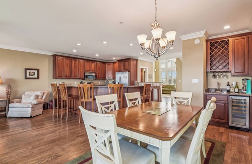 Fenwick Island House | Activities included up to $300 FREE PER WEEK! NEW LISTING 2024! Exceptional and spacious multi-level 4 bedroom plus den, 4 full bath townhome overlooking the bay offering panoramic views and glorious sunsets from any of the 3 open decks!