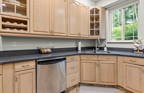 Sand Lake Villa | Anchorage Group Retreat | Dual King Suites + Theatre & Game