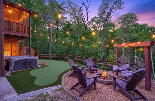 Ellijay Cabin | Arcade Cabin with Sauna, Cold Plunge, Hot Tub, Putting Green, and Mountain View