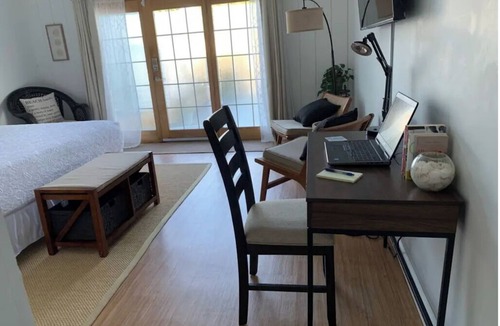 Rehoboth Beach Hotel | Blue Heron Room — Spacious Coastal Luxury with a Private Garden Patio