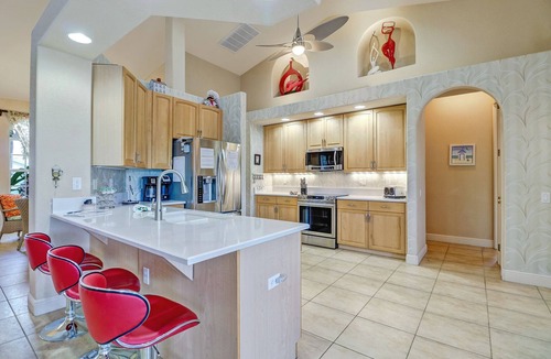 Pelican House | Blue Water 1022 Cape Coral Gulf Access Pool & Spa Home w/large Dock a. Tiki Hut