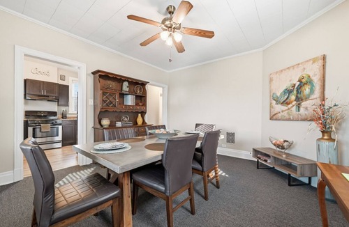 Brighton Heights Apartment | Bright 3BR near downtown with 2 private balconies, free parking, and a spotless, well-designed space. Easy access to stadiums, hospitals, and dining.