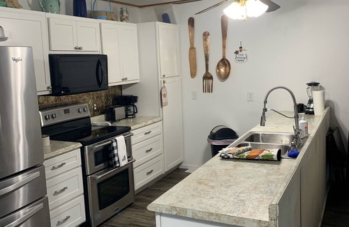 Doniphan House | Cabin Right on Current River, conveniently located close to town.