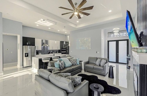 Trafalgar House | Canal front home with saltwater pool, hot tub, and washer and dryer.