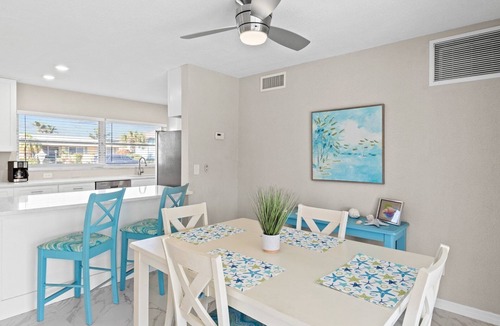 Yacht Club House | Casa Clara - 2 Bedroom, 2 Bath Vacation Home with Electric Heated Pool on Gulf Access Canal