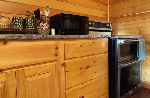 Island Falls Apartment | Charming 2-bedroom apartment above garage in Island Falls.