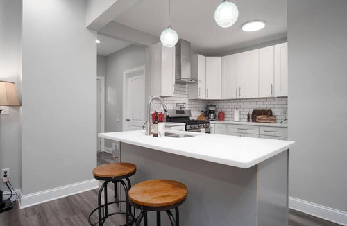 Near East Columbus House | Charming 4 Bedroom Home Near Downtown Columbus with Garage Parking and Backyard.