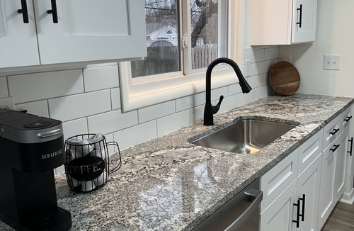 Mentor House | Charming Mentor Bungalow with Great Central Location and Fenced In Yard
