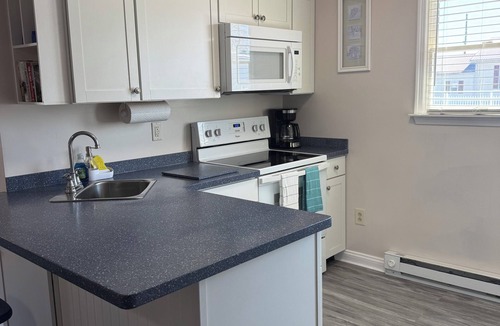 Long Neck Apartment | Charming two-bedroom, one bath, with screened porch is your perfect getaway.