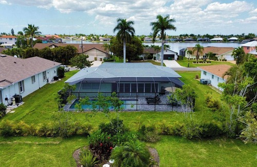 Eight Lakes House | Coastal Charm with Heated Pool