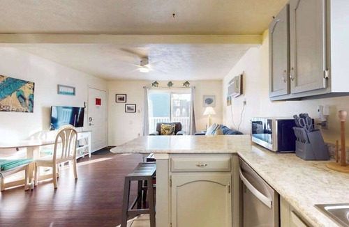 Caine Woods Condo | Condo Less than Two Miles to the Ocean with Pool, Fast WiFi, and Private W/D