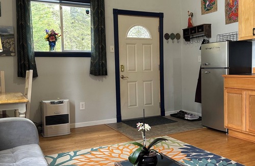 Kodiak Cottage | Cozy, quiet cottage surrounded by large spruce trees and Mountain View’s.
