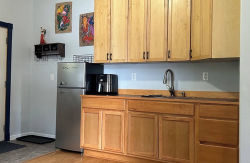Kodiak Cottage | Cozy, quiet cottage surrounded by large spruce trees and Mountain View’s.
