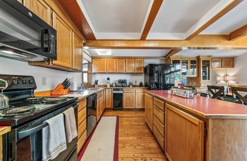 University Area House | Cozy Spacious 4-Level Home with XL HotTub in Midtown Anchorage