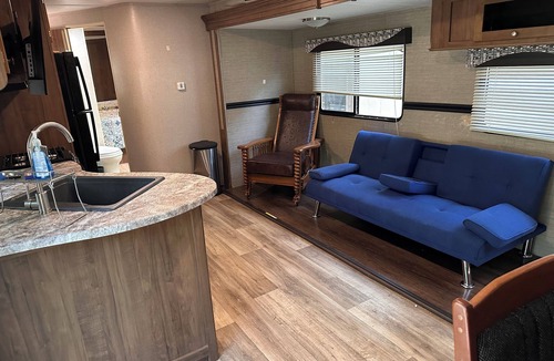 Lake Whitney House | Cozy Woodland RV Retreat in Clifton Texas on Beautiful Lake Whitney!