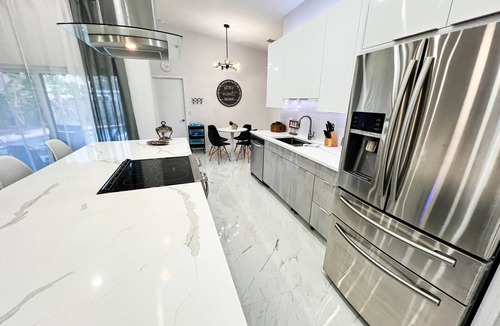 Dania Beach House | Dania Beach 4BR Cruise Retreat Heated SWater Pool Sleeps 10 Near Port Everglades