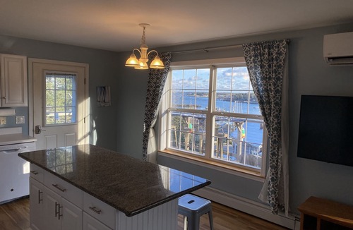 Southwest Harbor Apartment | Elevated Ocean view of Harbor, walk to village, pet friendly, deck, wifi and AC.