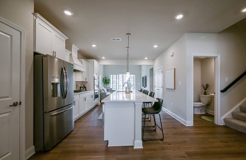 Long Neck House | Enjoy this new modern coastal 4BR/ 3.5 Bathroom townhome located at the Peninsula.
