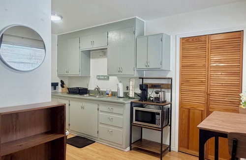 Russian Jack Park House | Entire single floor unit with yard access in a quiet, convenient neighborhood