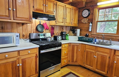 Willimantic Cabin | Escape to Howie's Camp: Unwind and Recharge at This Lakefront Log Cabin