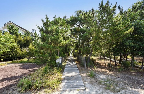 Bethany Beach House | Exceptional beach home located just steps from the beach front in beautiful family friendly Ocean Village, one of North Bethanyâ€™s most sought after private gated communities!