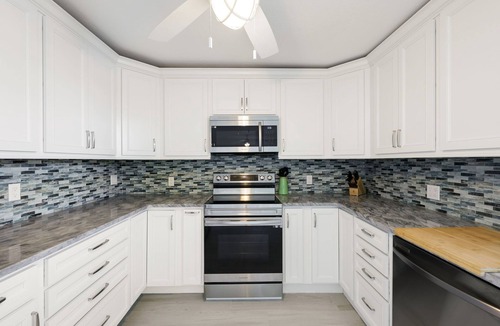 Matlacha Villa | Florida Style Villa by the Water with heated Pool, Dock, Gulf access! Kayaks!