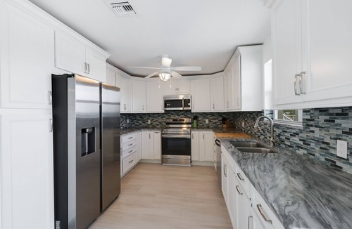 Matlacha Villa | Florida Style Villa by the Water with heated Pool, Dock, Gulf access! Kayaks!