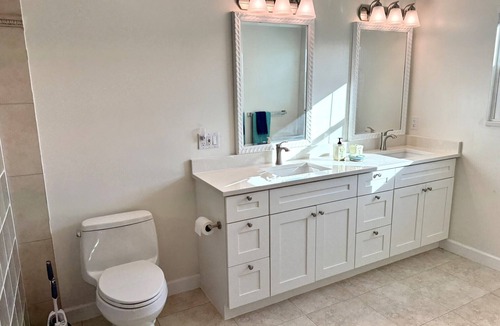 Mid Island House | Gulf Island Drive Pool Home, steps to soft, white sand beach!