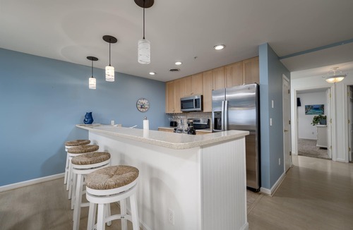 Rehoboth by the Sea Condo | HEART OF DEWEY BEACH- STEPS TO THE BEACH - 4 BR, 2 1/2 BA - IZZY PLAZA