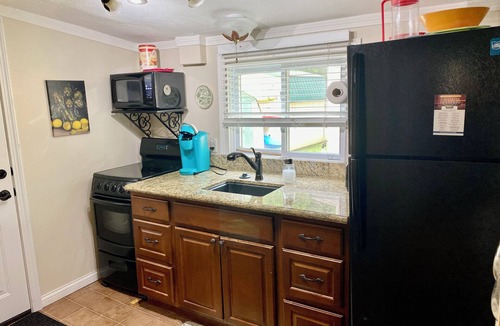 Russells Point Cottage | Historic Tiny Cottage just a short walk to the lake. Pet Friendly!